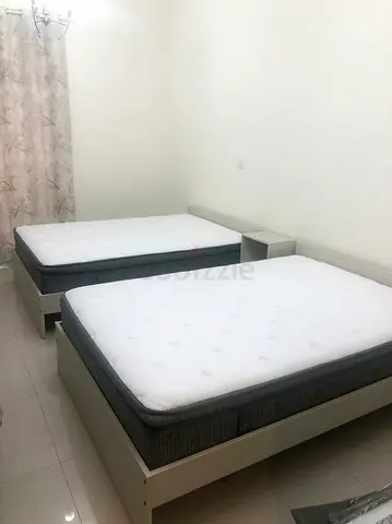 IKEA Gursken - Two beds with luxury mattresses and shared bedside table - Excellent Condition