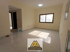 Spacious 1BR in Al Nuaimiya 2, Ajman with 2 bathrooms, central AC, large layout, and a family-friend
