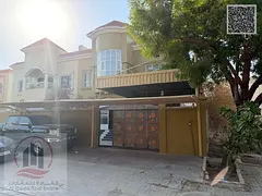 Villa for sale in Al Muwaihat, Ajman. Features 5 master bedrooms, a majlis, a living room, and a mai