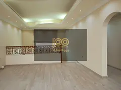 A spacious and distinctive two-story villa is now available for annual rent in the Al Nayfa area of