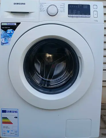 Fully automatic Samsung Front load 7kg washing machine.  perfect working condition. color is white.