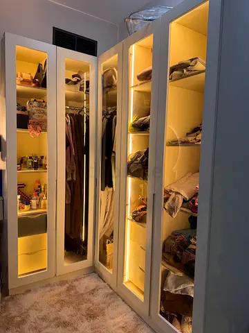 IKEA PAX-style fitted wardrobe with built-in lighting, white — excellent condition