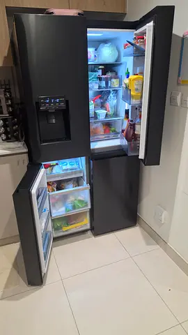 Black Side-by-Side Refrigerator with Water Dispenser - Used