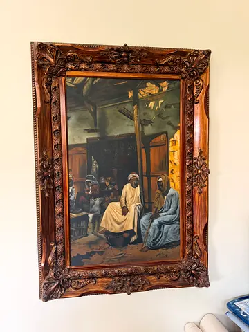 Vintage oil painting of market scene with ornate carved wooden frame