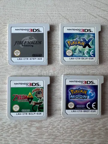 Bundle of 4 Nintendo 3DS Game Cartridges — Pokémon X, Pokémon Moon, Fire Emblem, Zelda