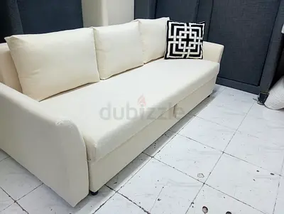 Beige 3 seater sofa bed with storage