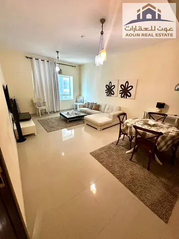 Furnished 1-bedroom apartment in Al Taawun | Near Dubai Exit | Spacious | Side view | Parking, gym, and pool | Only 40,000 | 4 or 5 installments