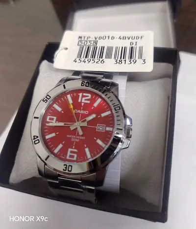 Casio MTP-VD01D stainless steel men's watch with red dial - unused in box