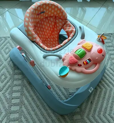 Baby walker with activity tray - gently used