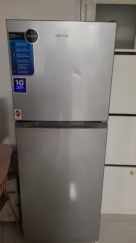 Silver double-door refrigerator - good working condition
