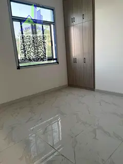 Elegant first-tenant 1-bedroom apartment in a brand-new building in Al Rashidiya 3, open kitchen, op