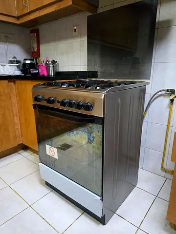 Moving out - Used freestanding gas cooker with oven - stainless finish