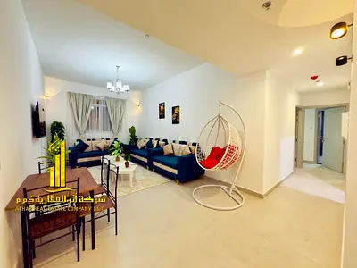 Luxury apartment, second occupancy. Two bedrooms, living room, and open balcony. Ajman Corniche. Fully furnished for monthly rent.