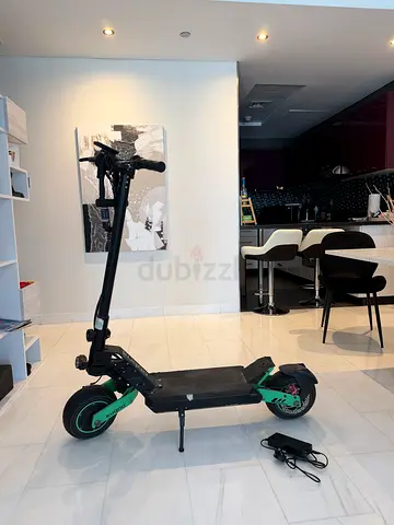 Adult Electric Scooter in Good Condition Green Accents Kugoo Z-930