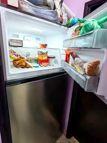 Used Double-Door Refrigerator - Compact Stainless Steel, Good Condition