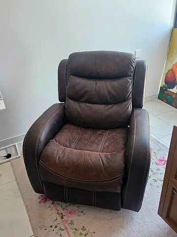 Brown single recliner armchair in good used condition