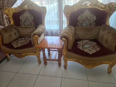 Pair of vintage-style ornate armchairs with side table and 2 cushion - good condition