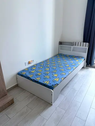 White single bed with storage headboard and mattress. 190cm x 90 cm medical mattress