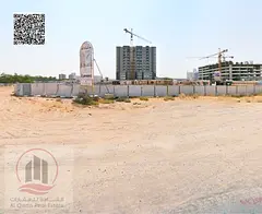 Land for sale in Al Amerah, Ajman, next to Smart Tower