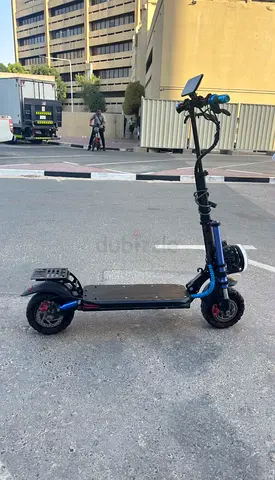 Dual-motor electric scooter with suspension — good condition and new battery range 40km speed 80km/h
