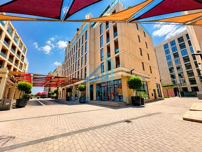 Modern Living in Al Mamsha: 1-Bed Apartment with Dual Balconies & Bathrooms