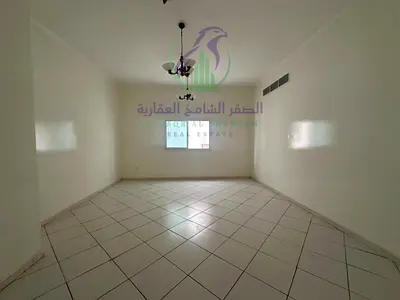 Two-bedroom apartment with living room for annual rent in Al Majaz 3 Contract attestation by landlord Balcony with open view Built-in wardrobes Spacio