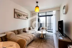 Branded Waterfront Living | Creek & Skyline Views