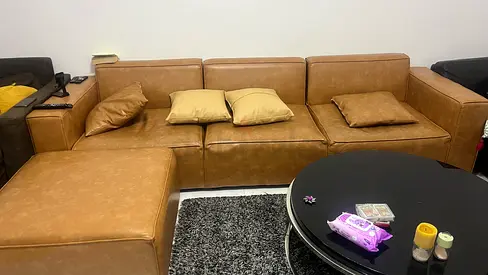 3-seater tan leather sofa with ottoman - good condition