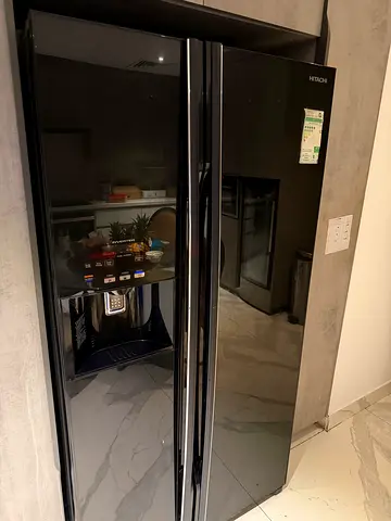 700L black side-by-side Hitachi refrigerator with water dispenser