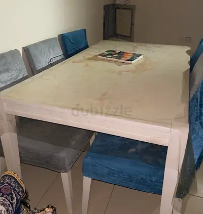 White dining table with 6 upholstered chairs - used, solid design