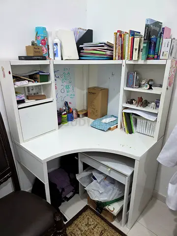 Compact white corner study desk with shelves and drawer