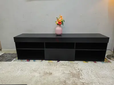 Modern Black TV Stand with Open Shelves and Storage Drawer