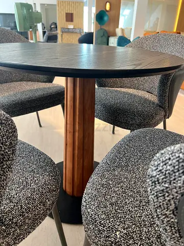 Round wooden dining table with 4 upholstered chairs - good condition