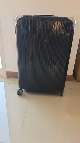 Rimowa hybrid large check in