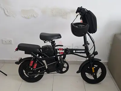 Compact folding electric bike - good condition, battery included