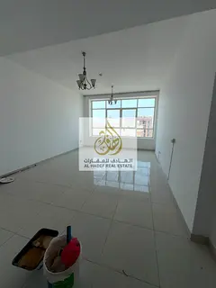 Al Rashidiya 3, next to Grand Mall and close to all public amenities; located directly on Sheikh Kha