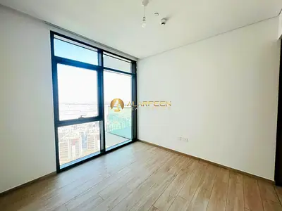 High-Floor 1BR | Canal & Pool View | Palace Residences