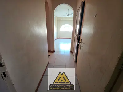 Affordable 2-Bedroom Apartment for Annual Rent in Al Rawda 3 | Closed Kitchen & Prime Street Location