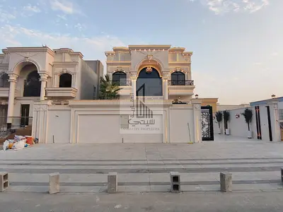 Luxury villa with high-end custom finishing for sale in Al Muwaihat 2, Ajman – Swimming pool and ce
