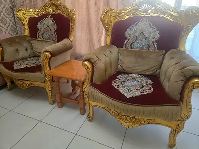 Pair of vintage-style ornate armchairs with side table and 2 cushion - good condition