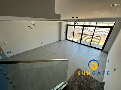 tiled garden , covered gated parking , brand new
