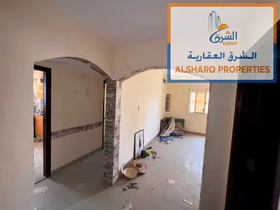 Spacious one-bedroom apartment with a living room in Al Nuaimiya 1, featuring central air condition