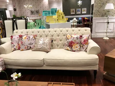 Beige Tufted 3-Seater Sofa with Floral Cushions