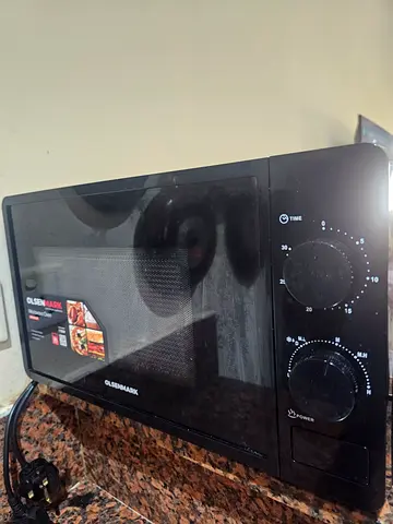 Compact Olsenmark Countertop Microwave Oven - Good Working Condition