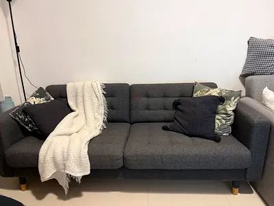 Dark grey 3-seater sofa in good condition with cushions
