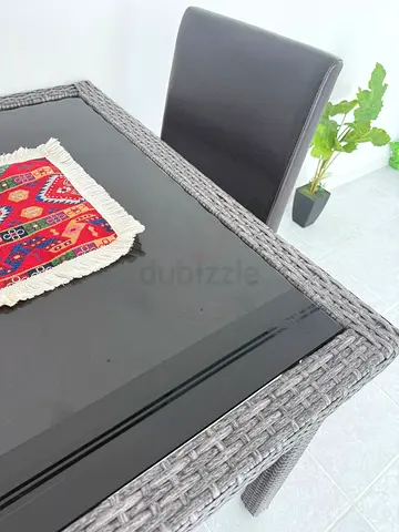 Dining Table with Glass Top and Padded Seats