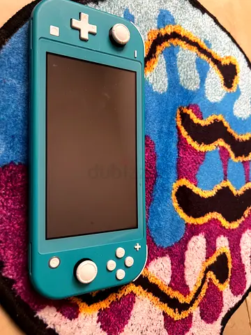 Teal Nintendo Switch Lite - Good Working Condition + 5 GAMES