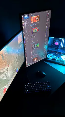 Gaming PC Setup with RGB Case, Dual Monitors and Mechanical Keyboard