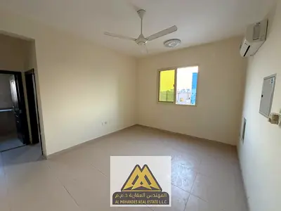 Spacious 1BR in Al Rawda 3, split AC, near Sheikh Ammar St, AED 26,009 yearly, 4 payments.