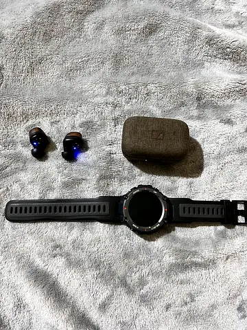 Used multisport GPS smartwatch with true wireless earbuds (pair) - good condition